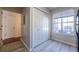 Laundry room with white closet doors and large window at 3284 Long Iron Pl, Lawrenceville, GA 30044