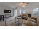 Spacious living room featuring a fireplace and neutral tones at 3284 Long Iron Pl, Lawrenceville, GA 30044