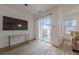View of patio through sliding glass doors at 3284 Long Iron Pl, Lawrenceville, GA 30044