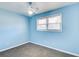 Light blue bedroom with gray carpet and ceiling fan at 24 Echo Ridge Dr, Powder Springs, GA 30127