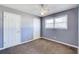 Spacious bedroom with carpet and ceiling fan at 24 Echo Ridge Dr, Powder Springs, GA 30127
