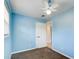 Light blue bedroom with ceiling fan and carpet at 24 Echo Ridge Dr, Powder Springs, GA 30127