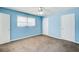 Light blue bedroom with two closets and carpet at 24 Echo Ridge Dr, Powder Springs, GA 30127