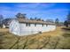 White side of house with AC unit and large yard at 24 Echo Ridge Dr, Powder Springs, GA 30127