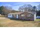 Ranch house featuring a brick facade and a large yard at 24 Echo Ridge Dr, Powder Springs, GA 30127