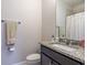 Small bathroom with granite countertop and shower at 3009 Devoncroft Se St, Smyrna, GA 30080