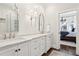 Bathroom boasts double vanity, marble countertops, and walk-in shower at 566 Church Ne St, Marietta, GA 30060