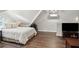 Serene bedroom with a queen bed and hardwood floors at 566 Church Ne St, Marietta, GA 30060