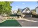Detached garage with artificial turf and stone accents at 566 Church Ne St, Marietta, GA 30060