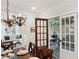 Dining room with French doors leading to a backyard patio at 566 Church Ne St, Marietta, GA 30060
