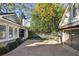 Long driveway with artificial turf and stone accents at 566 Church Ne St, Marietta, GA 30060