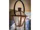 Copper hanging lantern with a clear glass exterior at 566 Church Ne St, Marietta, GA 30060