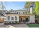 Updated craftsman home with covered patio and landscaped yard at 566 Church Ne St, Marietta, GA 30060