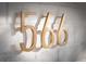 Modern gold house numbers on a white brick wall at 566 Church Ne St, Marietta, GA 30060