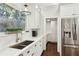White kitchen with stainless steel appliances and pantry at 566 Church Ne St, Marietta, GA 30060