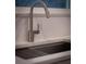 Modern kitchen sink with stainless steel faucet and drainer at 566 Church Ne St, Marietta, GA 30060