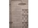 Elegant shower with marble tile and rainfall shower head at 566 Church Ne St, Marietta, GA 30060