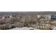 Expansive aerial view showcasing the property's location near lush greenery and the surrounding cityscape at 3325 Piedmont Ne Rd # 2702, Atlanta, GA 30305