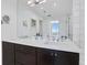 Bright bathroom with a double vanity, modern lighting, and a spacious layout, perfect for a contemporary lifestyle at 3325 Piedmont Ne Rd # 2702, Atlanta, GA 30305