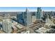 Wide aerial perspective of the city and surrounding areas, highlighting the urban environment at 3325 Piedmont Ne Rd # 2702, Atlanta, GA 30305