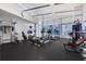 Well-equipped fitness center with modern exercise machines and floor to ceiling windows at 3325 Piedmont Ne Rd # 2702, Atlanta, GA 30305
