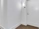 Hallway by the unit door with neutral carpet and walls, modern wall lighting, and simple base trim at 3325 Piedmont Ne Rd # 2702, Atlanta, GA 30305