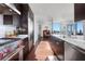 Spacious kitchen with a gourmet gas range, stainless steel appliances, and an open view to the living area at 3325 Piedmont Ne Rd # 2702, Atlanta, GA 30305