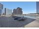 Relaxing rooftop pool area with comfortable lounge chairs and clear blue skies at 3325 Piedmont Ne Rd # 2702, Atlanta, GA 30305