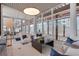 Bright and airy sitting area with stylish furniture and large windows showcasing a serene outdoor space at 3325 Piedmont Ne Rd # 2702, Atlanta, GA 30305