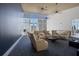 Relaxing sitting area features plush chairs, modern lighting, and large windows with city views at 3325 Piedmont Ne Rd # 2702, Atlanta, GA 30305