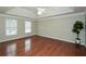 Main bedroom with hardwood floors, high ceilings and ceiling fan at 658 Wolfs Bane Nw Dr, Acworth, GA 30102