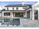 Luxury backyard with a pool, patio, outdoor kitchen, and a view of the house at 122 Owens Mill Pl, Canton, GA 30115