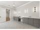 Elegant bathroom with double vanity and gray cabinets at 122 Owens Mill Pl, Canton, GA 30115