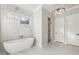 Luxury bathroom with soaking tub and walk-in shower at 122 Owens Mill Pl, Canton, GA 30115