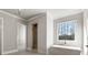 Spa-like bathroom with soaking tub, shower, and natural light at 122 Owens Mill Pl, Canton, GA 30115