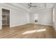 Bright bedroom with hardwood floors and walk-in closet at 122 Owens Mill Pl, Canton, GA 30115