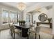 Bright dining room with hardwood floors and a large mirror at 122 Owens Mill Pl, Canton, GA 30115