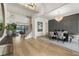 Elegant dining room featuring a statement chandelier and grey wall paneling at 122 Owens Mill Pl, Canton, GA 30115
