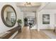 Bright and spacious entryway with hardwood floors and large mirror at 122 Owens Mill Pl, Canton, GA 30115
