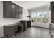 Functional laundry room with custom cabinetry and counter space at 122 Owens Mill Pl, Canton, GA 30115