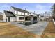 A long pool with a tanning ledge and a new construction modern farmhouse at 122 Owens Mill Pl, Canton, GA 30115