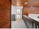 Upper hallway with wood and gray accents, carpeted floors at 1512 Flat Shoals Rd, Atlanta, GA 30349