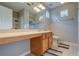 Main bathroom with wood vanity, double sinks, and a shower/tub combo at 359 Hiawassee Dr, Woodstock, GA 30188