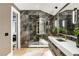 Stunning bathroom with a large walk-in shower and marble flooring at 211 N Esplanade, Alpharetta, GA 30009