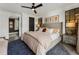 Bright bedroom with plush carpet and access to bathroom at 211 N Esplanade, Alpharetta, GA 30009