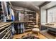 Well-organized closet with custom shelving and hanging rods at 211 N Esplanade, Alpharetta, GA 30009