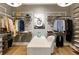 Large walk-in closet with ample shelving and hanging space at 211 N Esplanade, Alpharetta, GA 30009