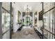 Spacious entryway with glass doors and stylish decor at 211 N Esplanade, Alpharetta, GA 30009