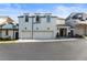 Three-car garage and charming curb appeal at 211 N Esplanade, Alpharetta, GA 30009
