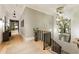 Bright hallway with exposed brick and hardwood floors at 211 N Esplanade, Alpharetta, GA 30009